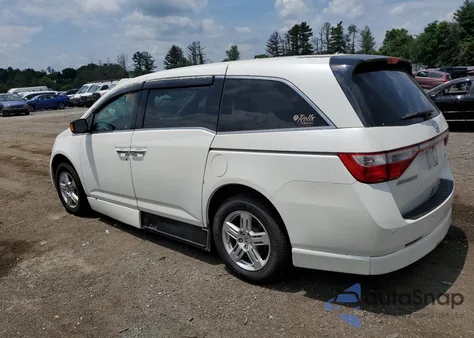 2012 Honda Odyssey Touring z USA, uszkodzony, nr VIN 5FNRL5H9XCB031860